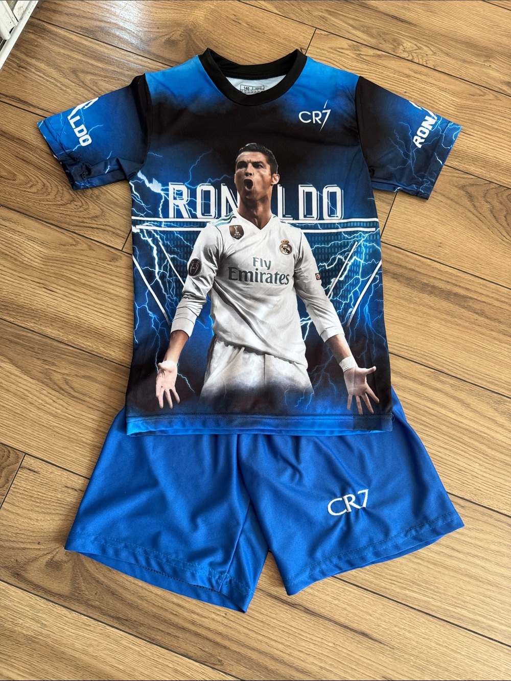 Brand new Ronaldo soccer jersey with shorts size 140